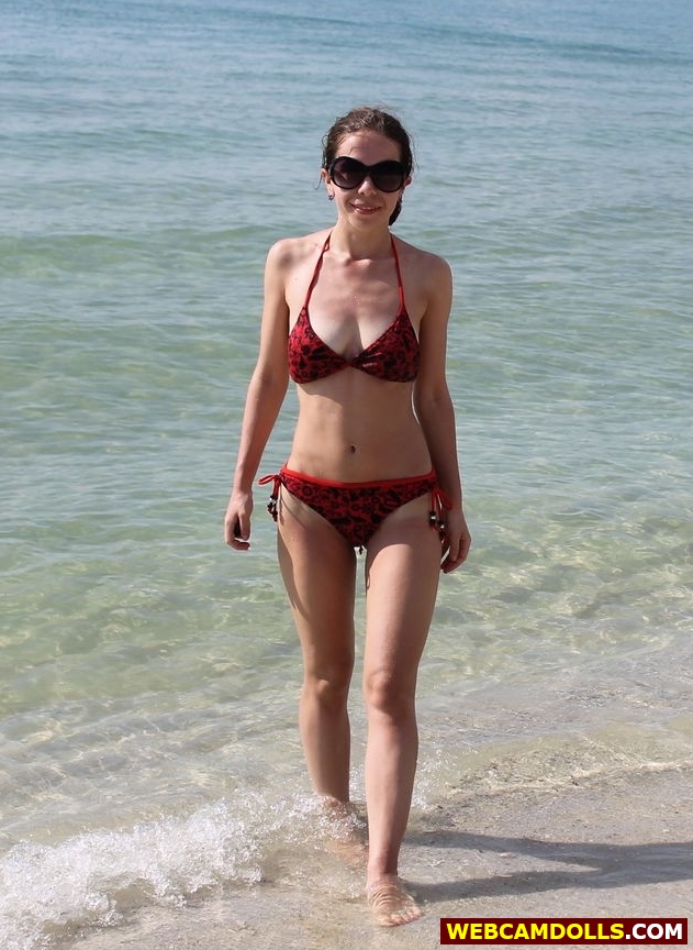 Brown Haired Girl wearing Red Bikini on Beach on Webcamdolls